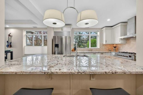 107-121 Quarry Way Se, Calgary, AB - Indoor Photo Showing Kitchen With Upgraded Kitchen