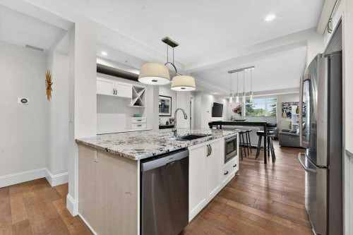 107-121 Quarry Way Se, Calgary, AB - Indoor Photo Showing Kitchen With Stainless Steel Kitchen With Upgraded Kitchen