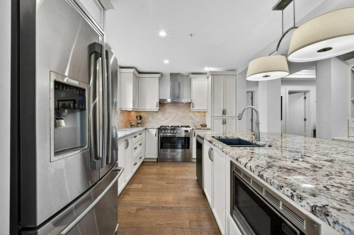 107-121 Quarry Way Se, Calgary, AB - Indoor Photo Showing Kitchen With Stainless Steel Kitchen With Upgraded Kitchen