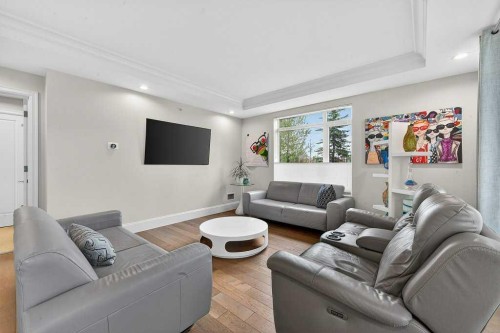 107-121 Quarry Way Se, Calgary, AB - Indoor Photo Showing Living Room