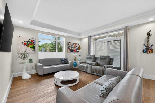 107-121 Quarry Way Se, Calgary, AB - Indoor Photo Showing Living Room