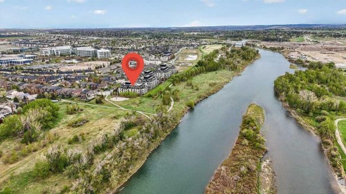 107-121 Quarry Way Se, Calgary, AB - Outdoor With Body Of Water With View