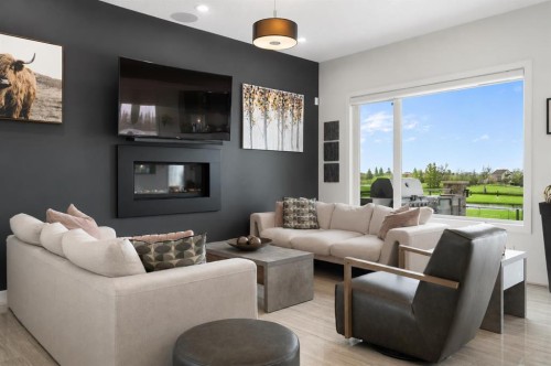 71 Muirfield Close, Lyalta, AB - Indoor Photo Showing Living Room With Fireplace