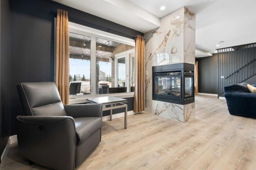 71 Muirfield Close, Lyalta, AB - Indoor Photo Showing Other Room With Fireplace