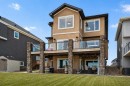 71 Muirfield Close, Lyalta, AB  - Outdoor With Deck Patio Veranda With Facade 