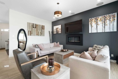 71 Muirfield Close, Lyalta, AB - Indoor Photo Showing Living Room With Fireplace