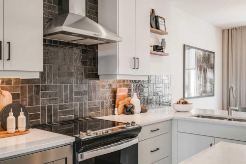 708 Sovereign Common Sw, Calgary, AB - Indoor Photo Showing Kitchen With Double Sink With Upgraded Kitchen