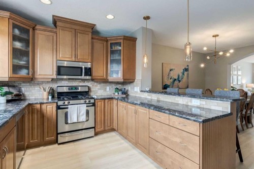 3117 Don Ethell Boulevard Sw, Calgary, AB - Indoor Photo Showing Kitchen