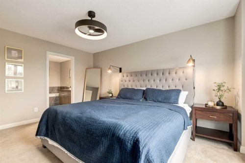 3117 Don Ethell Boulevard Sw, Calgary, AB - Indoor Photo Showing Bedroom