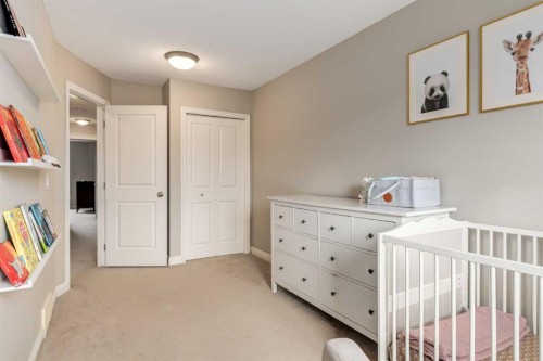 3117 Don Ethell Boulevard Sw, Calgary, AB - Indoor Photo Showing Bedroom