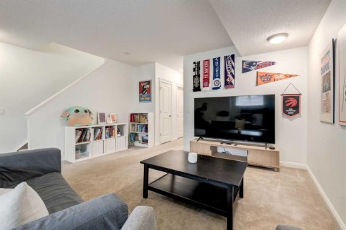 3117 Don Ethell Boulevard Sw, Calgary, AB - Indoor Photo Showing Living Room