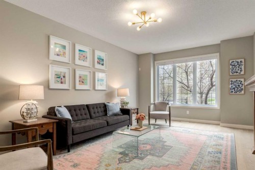3117 Don Ethell Boulevard Sw, Calgary, AB - Indoor Photo Showing Living Room