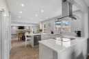 38 Suntree Lane, Okotoks, AB  - Indoor Photo Showing Kitchen With Upgraded Kitchen 