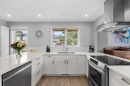 38 Suntree Lane, Okotoks, AB  - Indoor Photo Showing Kitchen With Double Sink With Upgraded Kitchen 