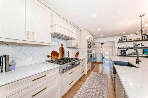 19 Mackay Drive Sw, Calgary, AB - Indoor Photo Showing Kitchen With Upgraded Kitchen