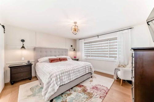 19 Mackay Drive Sw, Calgary, AB - Indoor Photo Showing Bedroom