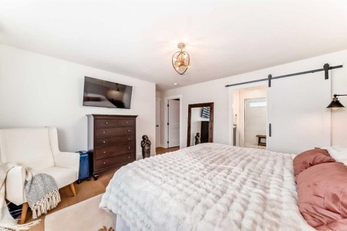 19 Mackay Drive Sw, Calgary, AB - Indoor Photo Showing Bedroom