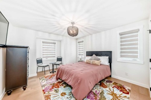 19 Mackay Drive Sw, Calgary, AB - Indoor Photo Showing Bedroom