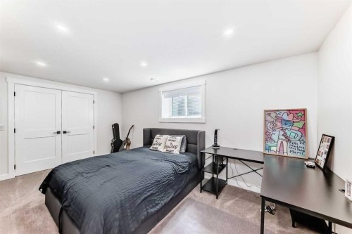 19 Mackay Drive Sw, Calgary, AB - Indoor Photo Showing Bedroom