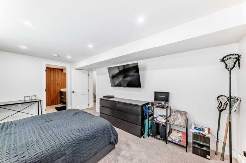 19 Mackay Drive Sw, Calgary, AB - Indoor Photo Showing Bedroom