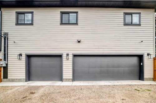 19 Mackay Drive Sw, Calgary, AB - Outdoor With Exterior