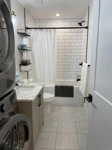 19 Mackay Drive Sw, Calgary, AB - Indoor Photo Showing Laundry Room