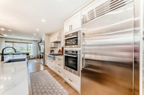 19 Mackay Drive Sw, Calgary, AB - Indoor Photo Showing Kitchen With Upgraded Kitchen