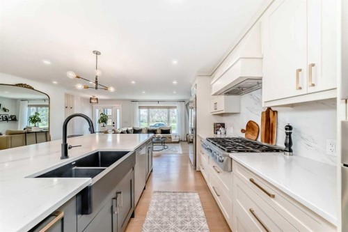 19 Mackay Drive Sw, Calgary, AB - Indoor Photo Showing Kitchen With Double Sink With Upgraded Kitchen
