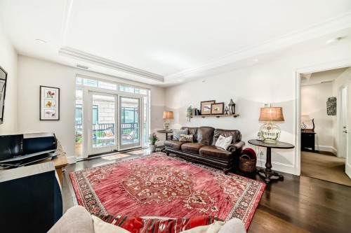 105-121 Quarry Way Se, Calgary, AB - Indoor Photo Showing Living Room