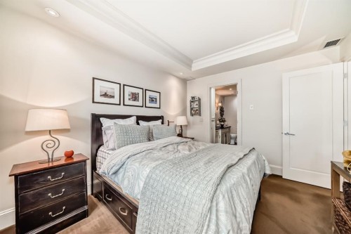 105-121 Quarry Way Se, Calgary, AB - Indoor Photo Showing Bedroom