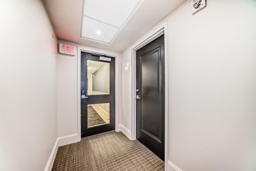 105-121 Quarry Way Se, Calgary, AB - Indoor Photo Showing Other Room