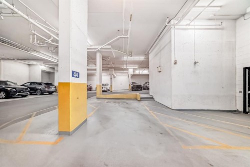 105-121 Quarry Way Se, Calgary, AB - Indoor Photo Showing Garage
