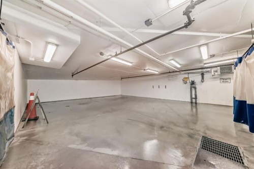 105-121 Quarry Way Se, Calgary, AB - Indoor Photo Showing Garage