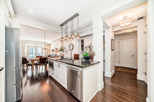 105-121 Quarry Way Se, Calgary, AB - Indoor Photo Showing Kitchen With Stainless Steel Kitchen With Upgraded Kitchen