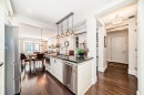 105-121 Quarry Way Se, Calgary, AB  - Indoor Photo Showing Kitchen With Stainless Steel Kitchen With Upgraded Kitchen 