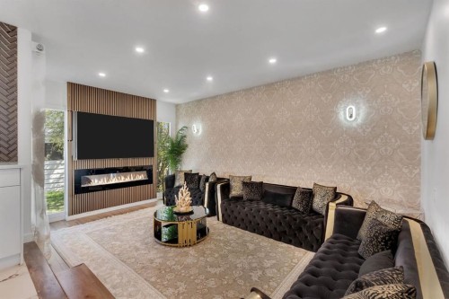316 Templeton Circle Ne, Calgary, AB - Indoor Photo Showing Living Room With Fireplace