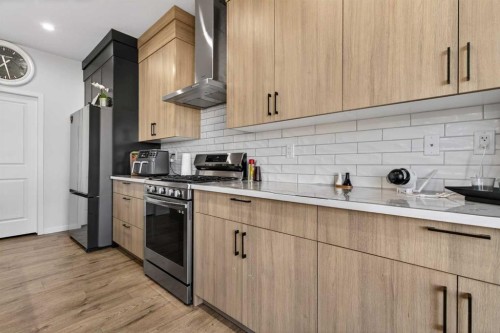 36 Royston Rise Nw, Calgary, AB - Indoor Photo Showing Kitchen