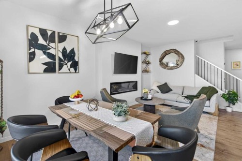 36 Royston Rise Nw, Calgary, AB - Indoor With Fireplace