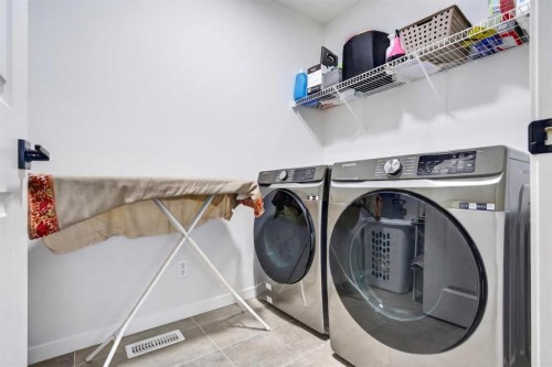 36 Royston Rise Nw, Calgary, AB - Indoor Photo Showing Laundry Room