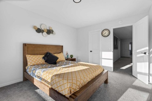 36 Royston Rise Nw, Calgary, AB - Indoor Photo Showing Bedroom