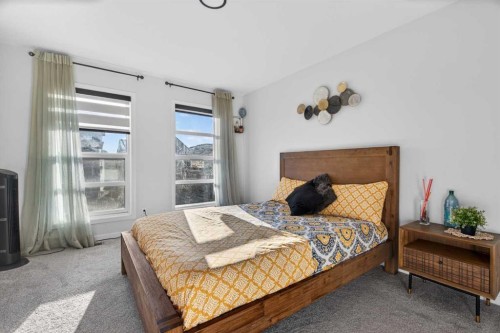 36 Royston Rise Nw, Calgary, AB - Indoor Photo Showing Bedroom