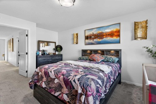 36 Royston Rise Nw, Calgary, AB - Indoor Photo Showing Bedroom
