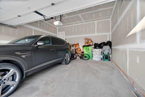36 Royston Rise Nw, Calgary, AB - Indoor Photo Showing Garage