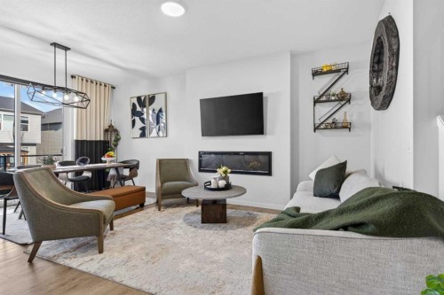 36 Royston Rise Nw, Calgary, AB - Indoor Photo Showing Other Room With Fireplace