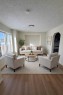 107 Harvest Oak Crescent Ne, Calgary, AB  - Indoor Photo Showing Living Room 