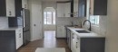 107 Harvest Oak Crescent Ne, Calgary, AB  - Indoor Photo Showing Kitchen With Double Sink With Upgraded Kitchen 