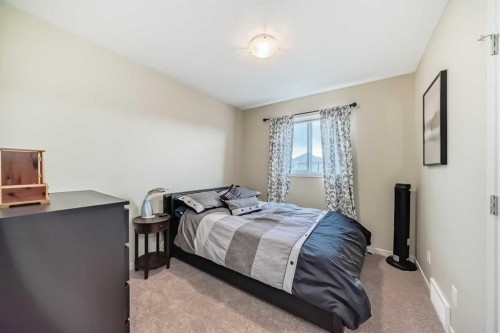 144 Copperpond Parade Se, Calgary, AB - Indoor Photo Showing Bedroom
