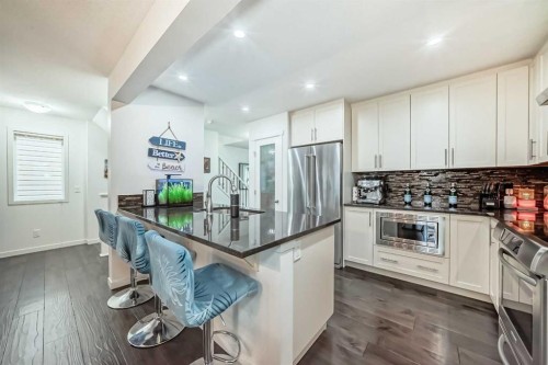 144 Copperpond Parade Se, Calgary, AB - Indoor Photo Showing Kitchen With Upgraded Kitchen