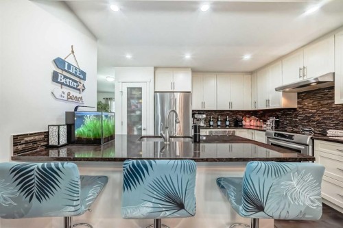 144 Copperpond Parade Se, Calgary, AB - Indoor Photo Showing Kitchen With Stainless Steel Kitchen