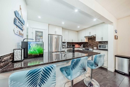 144 Copperpond Parade Se, Calgary, AB - Indoor Photo Showing Kitchen With Stainless Steel Kitchen With Upgraded Kitchen